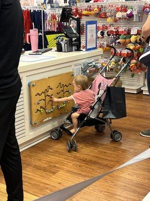 My 1 year old loves the puzzles by the register