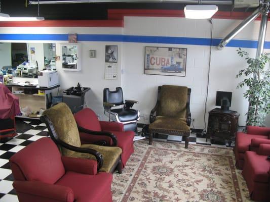 The waiting area, so comfortable as you wait to get the best haircut in town