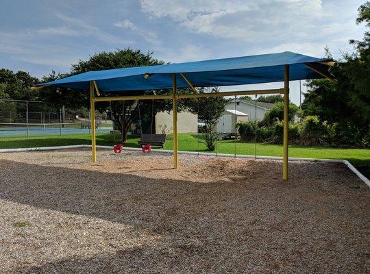 Shaded and covered swings