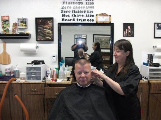 Jill cutting a military flattop