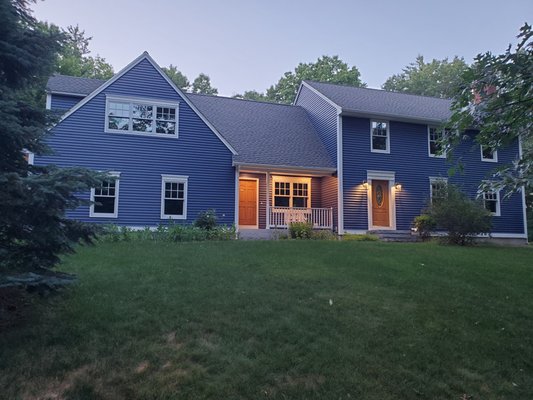 After #2.  Claude and JeanMarc constructed beautiful door and window trim for the front of the house.