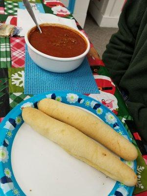 Chili and breadsticks.