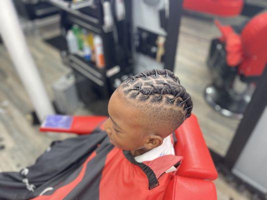 Dreads re-twist with a low fade