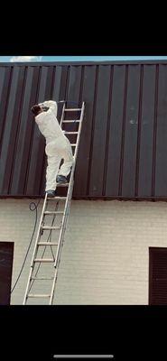 Spraying the upper portion of a church