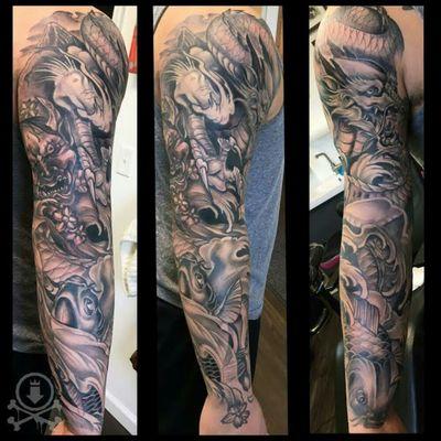 Black and grey Japanese themed full sleeve tattoo by Meghan Patrick.