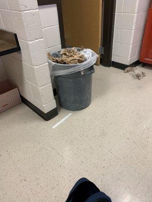 One of the trash cans in the art room