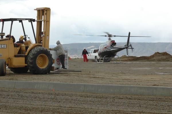 Preparing to lift equipment on to roof of Rudolf Foods project.