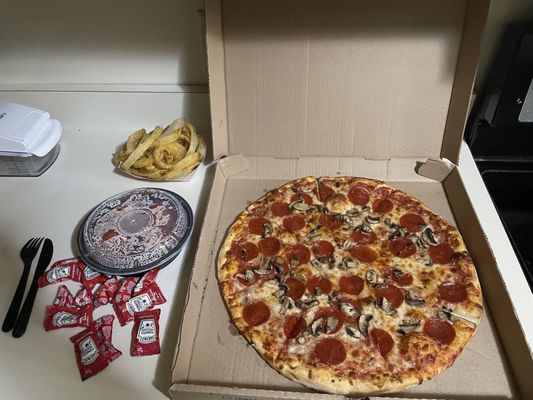 Pizza, meatballs and onion rings.