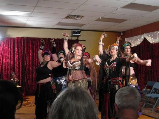 bellydancers perform at a studio event