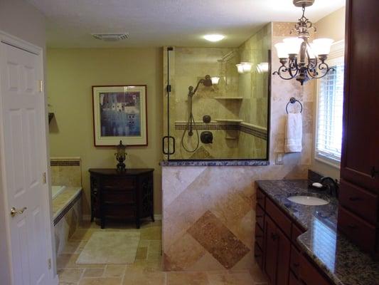 H A Construction remodeled this bath in 2009 took out a walk in closet and 
space in the garage to make it bigger.