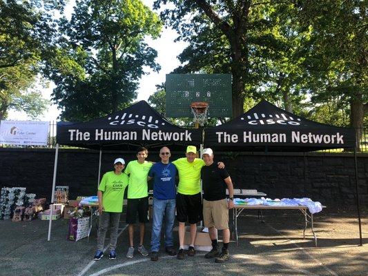 volunteers from Cisco and Morgan Stanley setting up for a huge volunteer day revitalizing neighborhoods in Yonkers