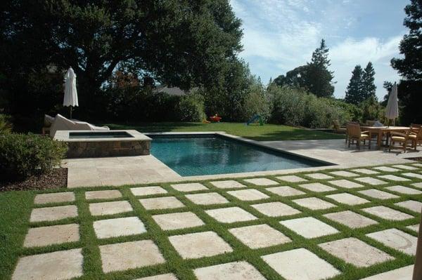 Pool and spa with Travertine Decking and Sod