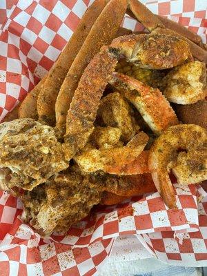 Snow crabs corn sausage shrimp potato homemade garlic butter sauce