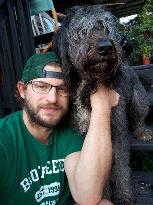 This is Buckley and I.  He is a Bernedoodle.  He loves to swim and cuddle!  He's my baby!