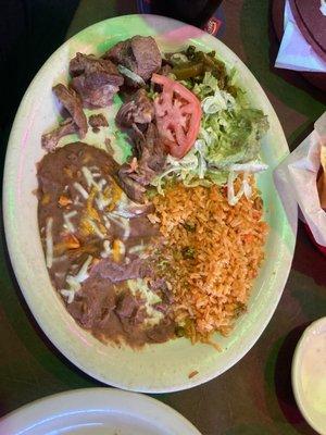 Carnitas with Rice and Beans, served with side of salad with guacamole and soft tortillas