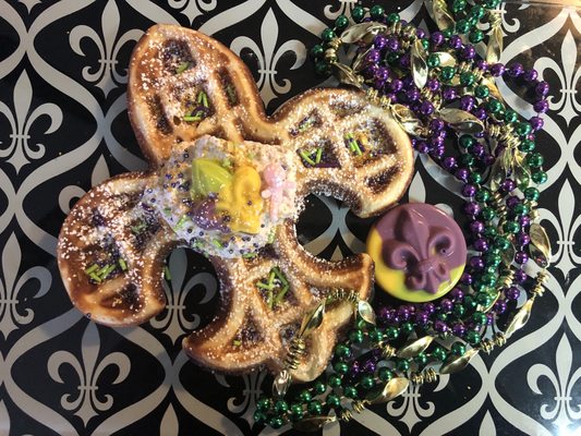 Our signature fleur de lis waffles. These were served swing Mardi Gras Season