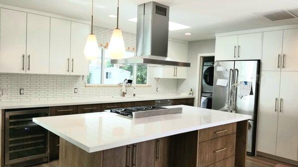 A new kitchen and laundry room with a simple, clean and timeless look!