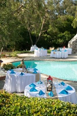 A lovely pool side party hosted and decorated by Anar Party Rentals.