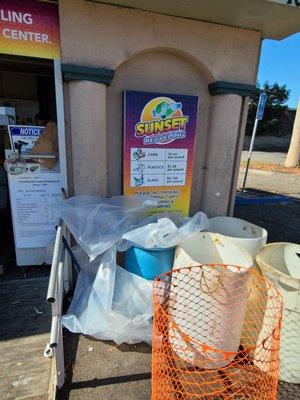 Enough trash cans on the side to throw away year empty bags in also cans bottles and plastic pricing