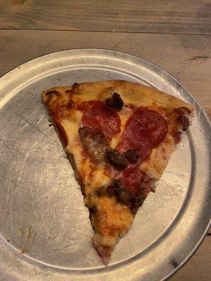 Tiny $4 slice of pizza