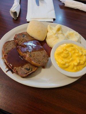 Cowboy meat loaf macaroni n cheese with mashed potatoes.