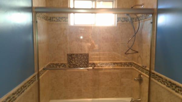 we do a lot of showers and tile work , always done right and no leaks . custom tile work and strait grout lines always