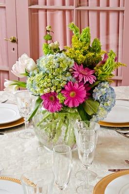 Crystal bowl with hydrangeas, gerbera daisies and tulips with bells of Ireland