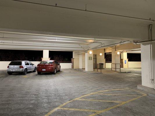 The garage is clean, well-lit and has both stairs and an elevator.