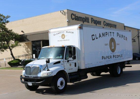 Clampitt Paper delivery truck in front of Dallas Headquarters.