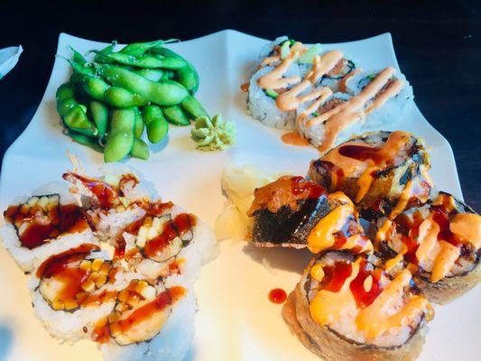 Sampler platter with edamame, spicy tuna roll, tempura shrimp roll and ocean ching roll