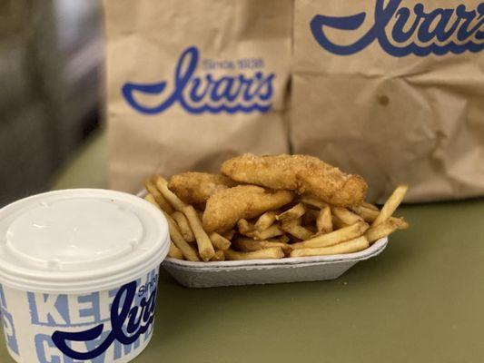 3 piece fish and chips with a bowl of clam chowder