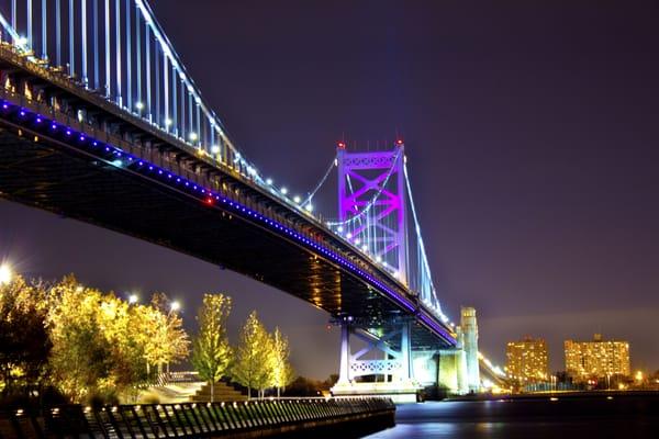 Benjamin Franklin Bridge lit up at night...