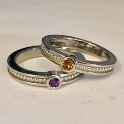 Mother's rings, exclusive design of Stucchi Jewelers.