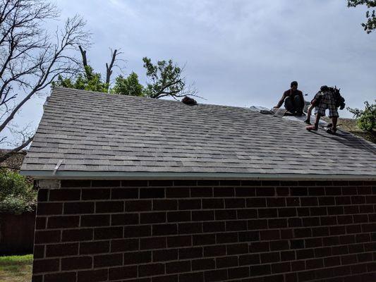 Re roof farm garage shingle roof.