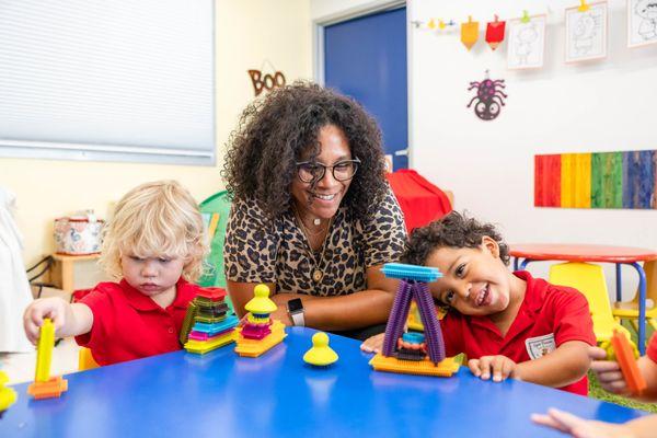 Preschoolers building towers