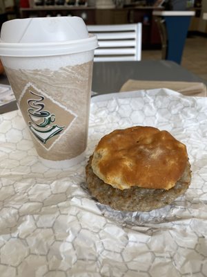 Waiting for the Tesla to charge, grabbing a sausage biscuit that's pretty awesome