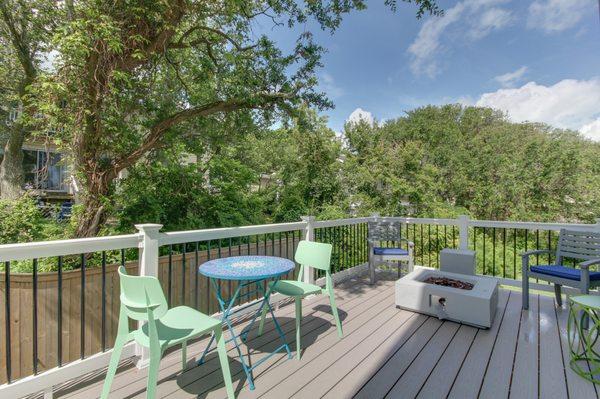 Ascreened porch and new composite deck perfect for morning coffee or evening glasses of wine.