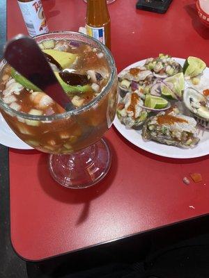 Campechana Cóctel and Oysters topped with Shrimp Ceviche and an aguachile