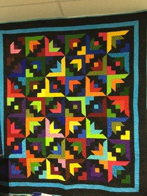 This colorful quilt is displayed in the shop. I just could not resist buying the kit that she has available.