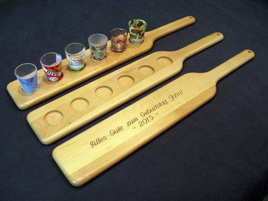 Custom engraved shot glass serving/spanking paddle. 100% reclaimed wood. Measures 24" L x 4" D x 3/4" H.