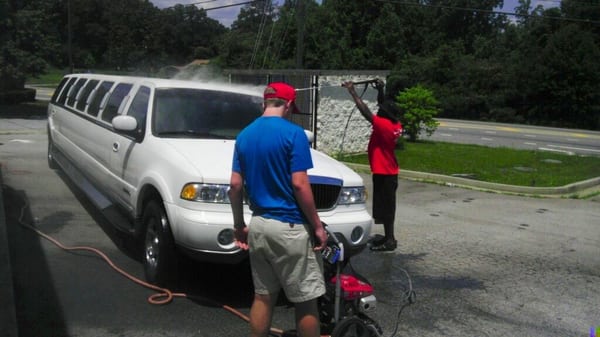 Cleaning the vehicle as a team makes everything smooth and ready for the customer