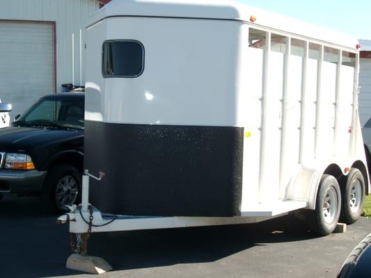 Gravel guard on horse trailer