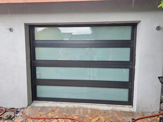 Bronze Frame 4 lites with Impact Glass Garage Door.