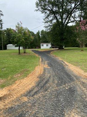 Rock being laid down and spread