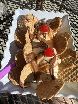 Ice cream nachos with Salted Caramel & Triple PB w/PB & caramel sauce topped w/cherries.