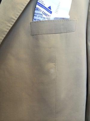 Rust colored dots on jacket they deny came from them. Said came from rain. Blamed Hugo boss material for ruining fabric