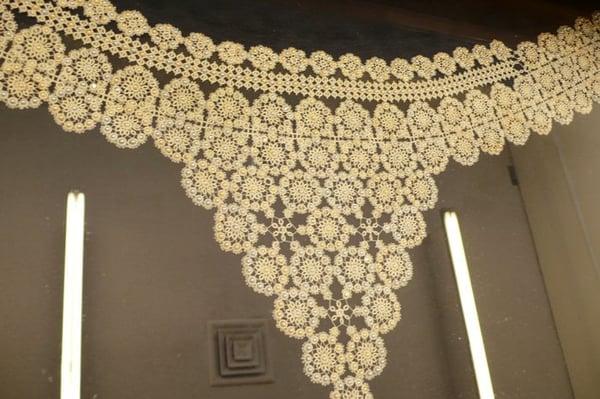 A current piece of lace embellished with Swarovski crystals