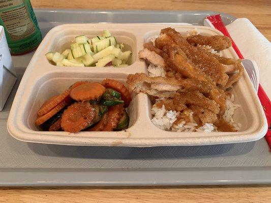 Lunch Special: Create your own dish - jasmine rice, crispy chicken, Grub Thai sauce, cucumber salad, and sauteed vegetable