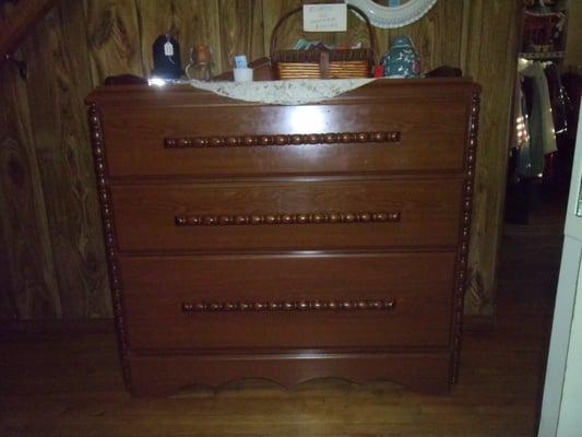 three drawer jenny lind dresser. just came in very sturdy piece of furniture.price. $50.00