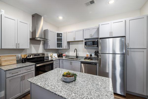 Stainless steel appliances in Kitchen